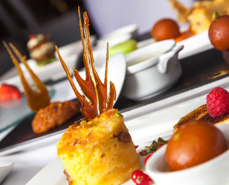 A plate of food at a caterer's table.